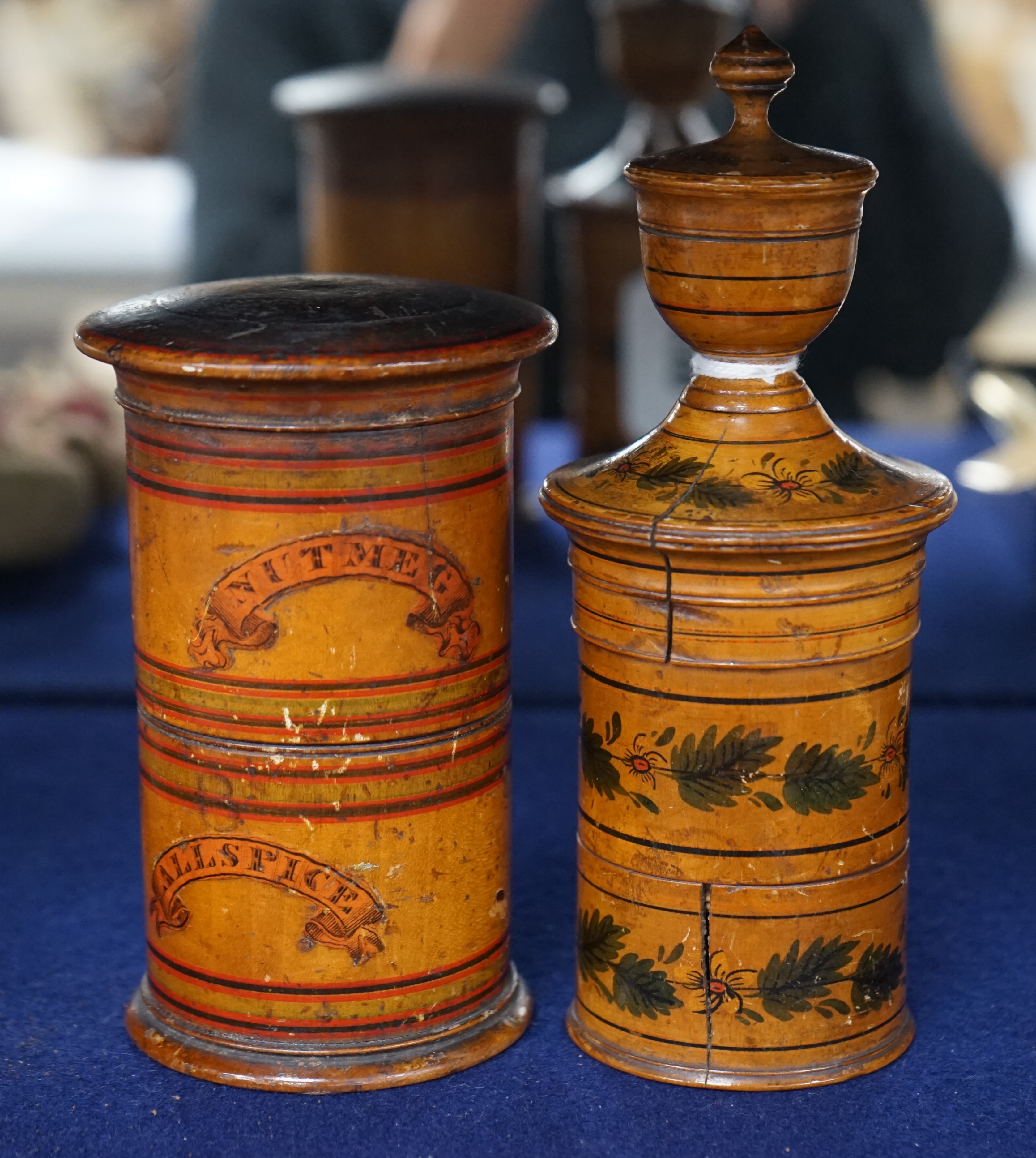 Two 19th century box wood spice towers with painted decoration, tallest 18cm high. Condition - fair, some splits to the wood